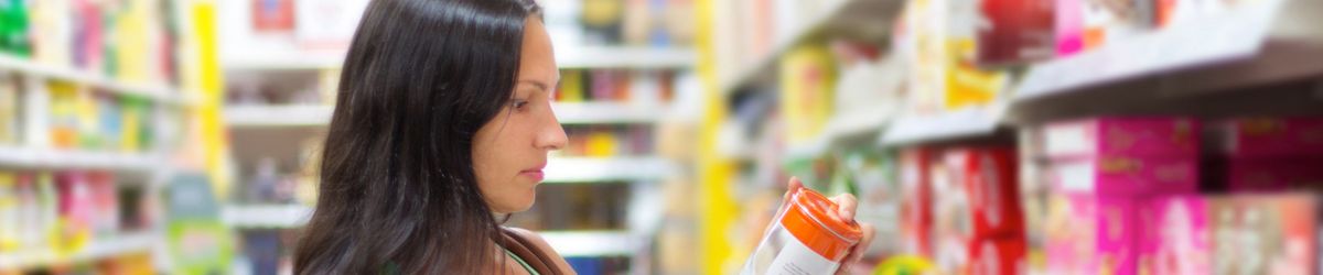 Non-GMO Project Blog Header Woman in grocery isle